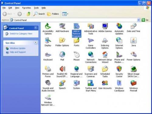 Slik installerer og konfigurerer systemkomponenter for Windows XP